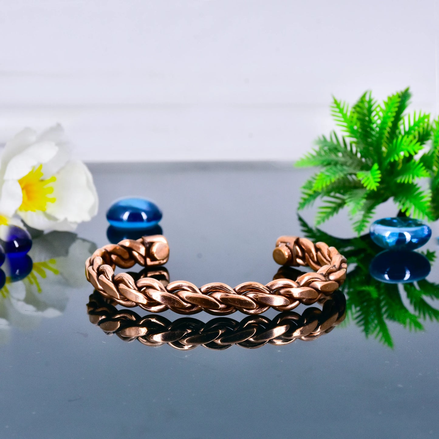 Copper Kada featuring a unique chain design. This handcrafted piece seamlessly blends traditional craftsmanship with contemporary fashion, making it a symbol of elegance and sophistication. Crafted from high-quality copper.